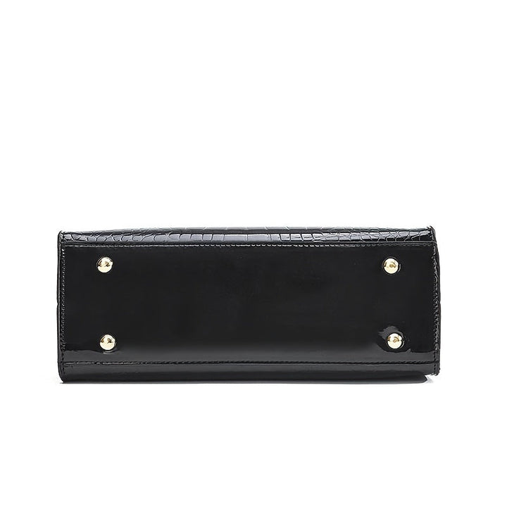 Chic women's shoulder bag with designer style and gold hardware