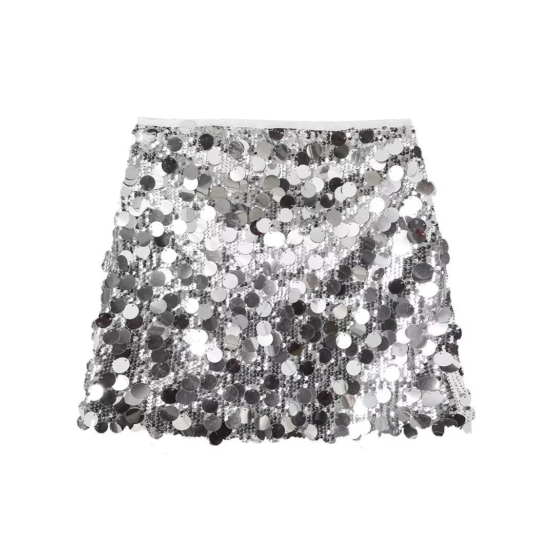 Detailed close-up of sequin mini skirt texture, sparkling party wear fabric
