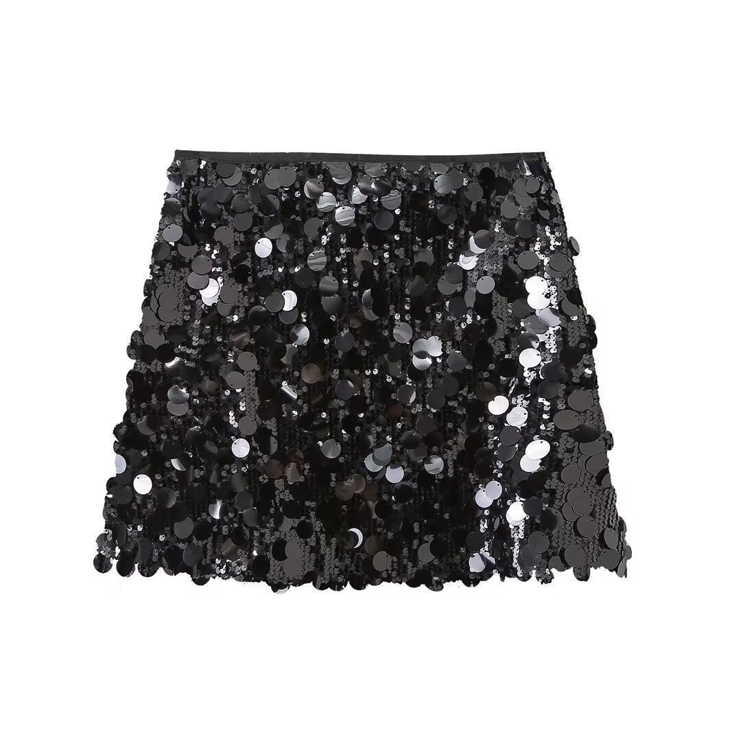 Flat lay view of the black sequin mini skirt showcasing all-over sequins