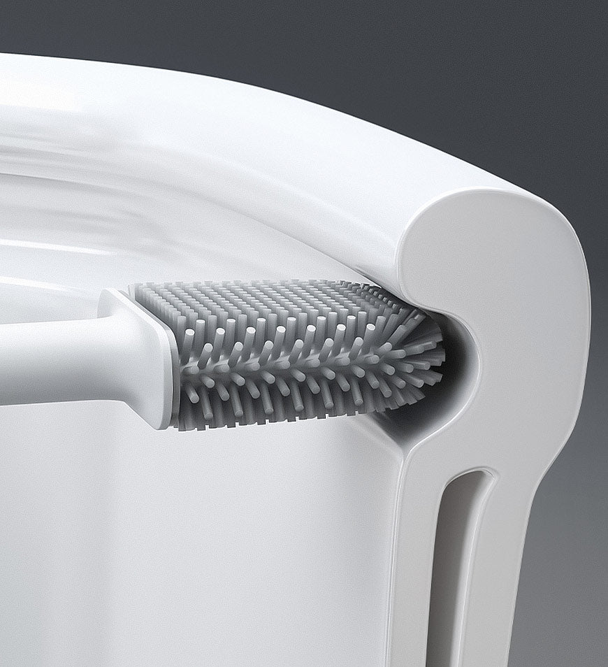 Flexible silicone toilet brush head cleaning underneath the toilet rim