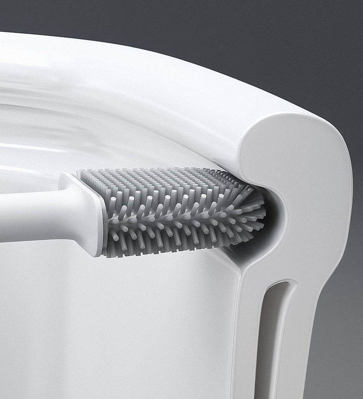 Flexible silicone toilet brush head cleaning underneath the toilet rim