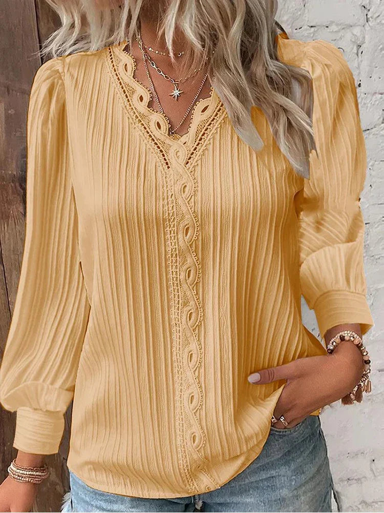 Stylish V-neck women's blouse ideal for layering in autumn fashion