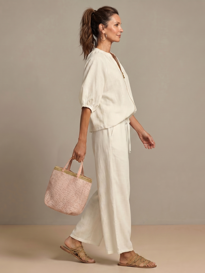 Stylish matching set showcasing the zip-front closure and blouson silhouette