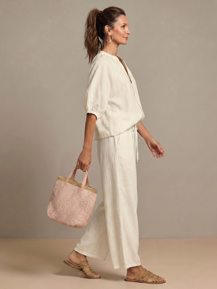 Stylish matching set showcasing the zip-front closure and blouson silhouette