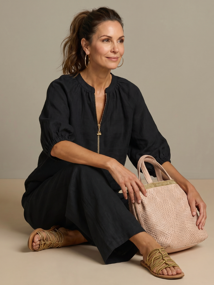 Modern women's co-ord set styled with chic accessories for a complete look