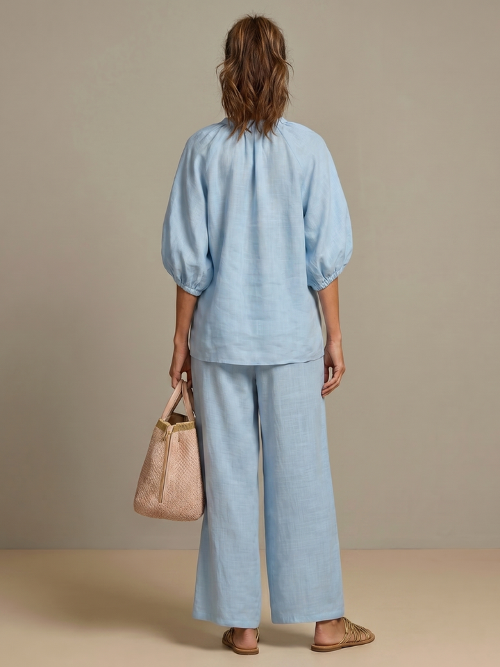 Women's zip-front blouson top and wide leg pants co-ord set in casual style