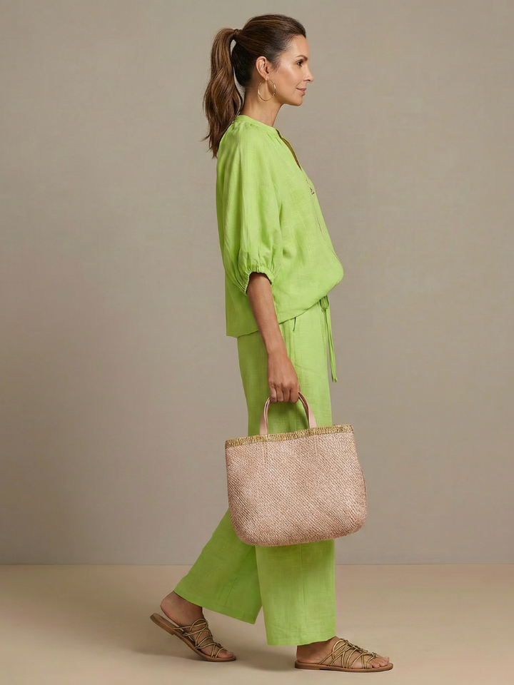 Trendy women's summer co-ord featuring a blouson bodice and wide leg bottoms