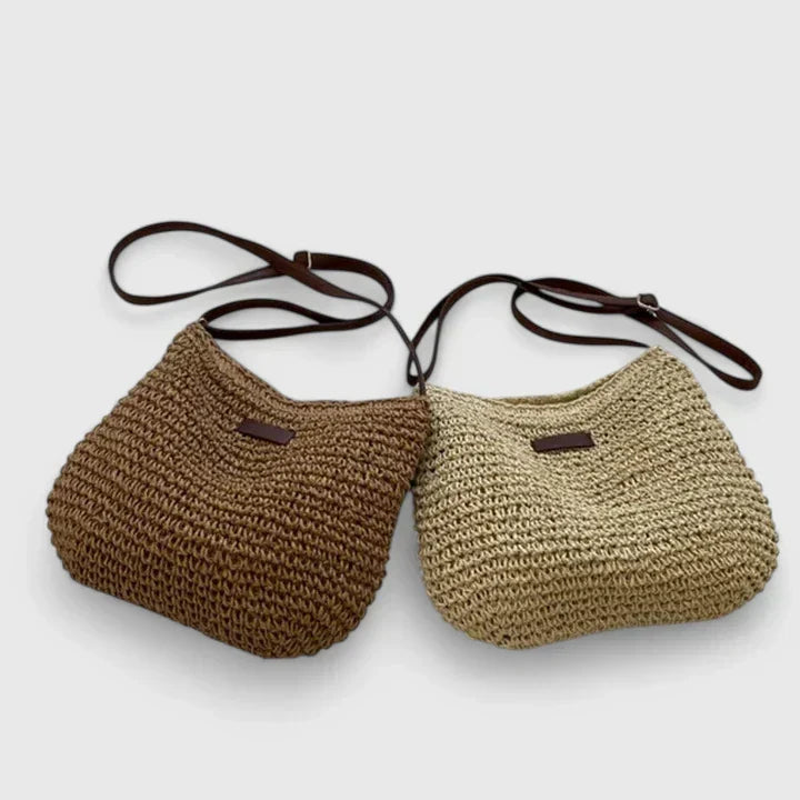 Beige and khaki woven straw crossbody bags displayed side by side