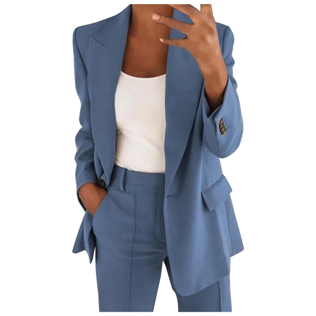 Woman wearing blue blazer and trousers two-piece suit set
