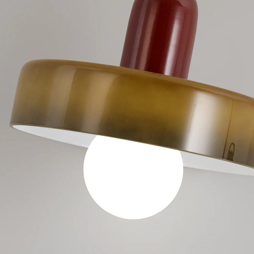 Complete modern LED pendant lamp setup shown in a showroom display