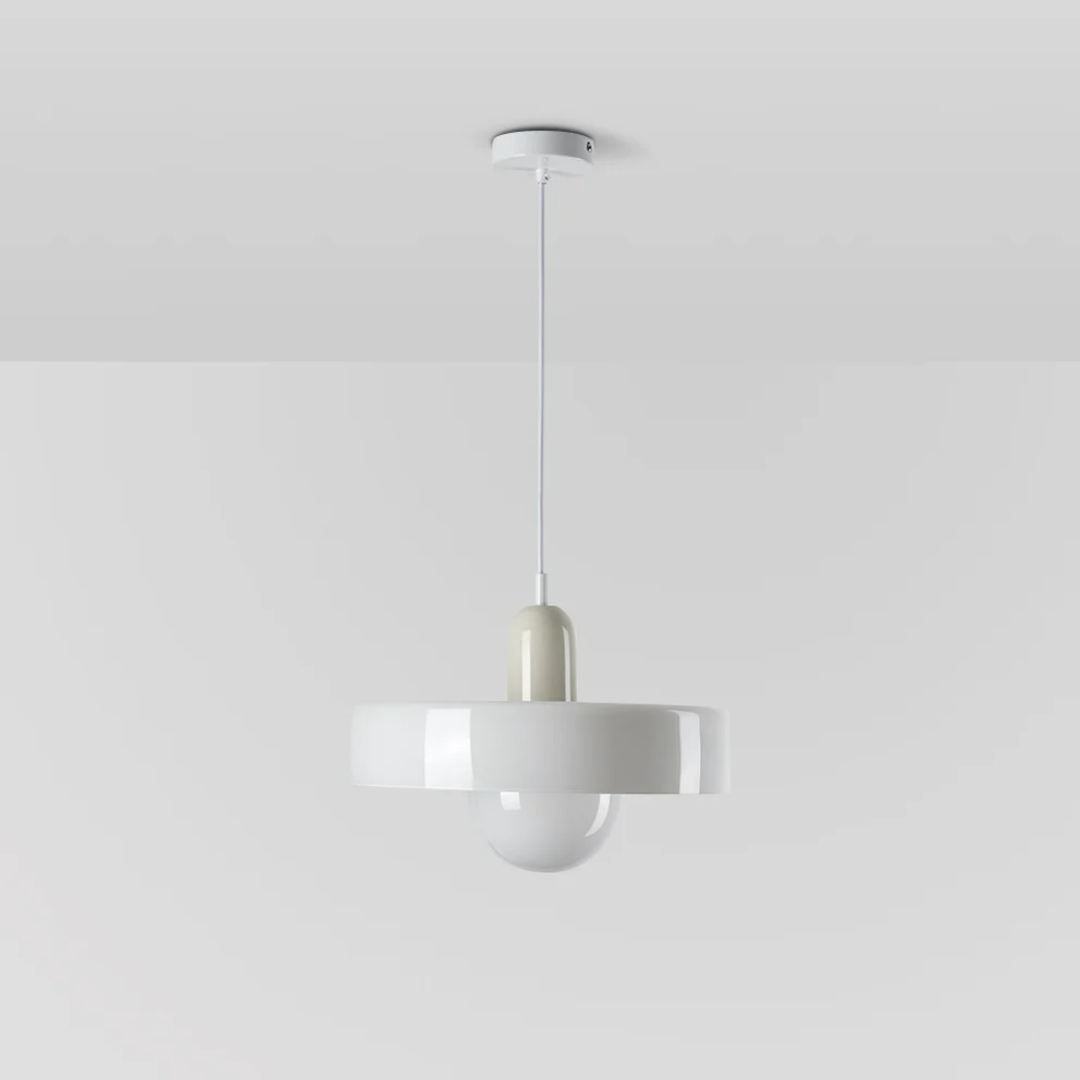 Minimalist bedroom light hanging elegantly from a metallic ceiling mount