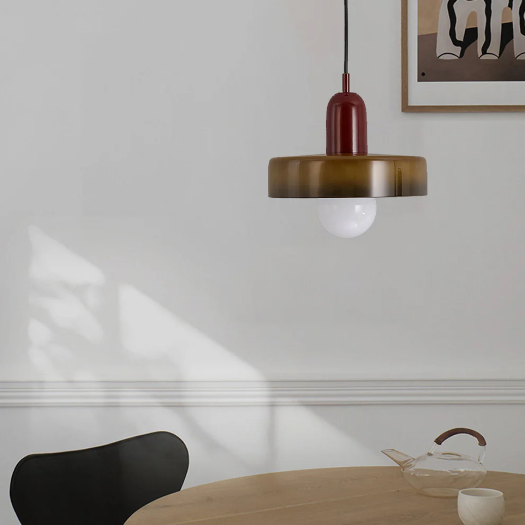 Modern glass pendant light detail highlighting the polished finish