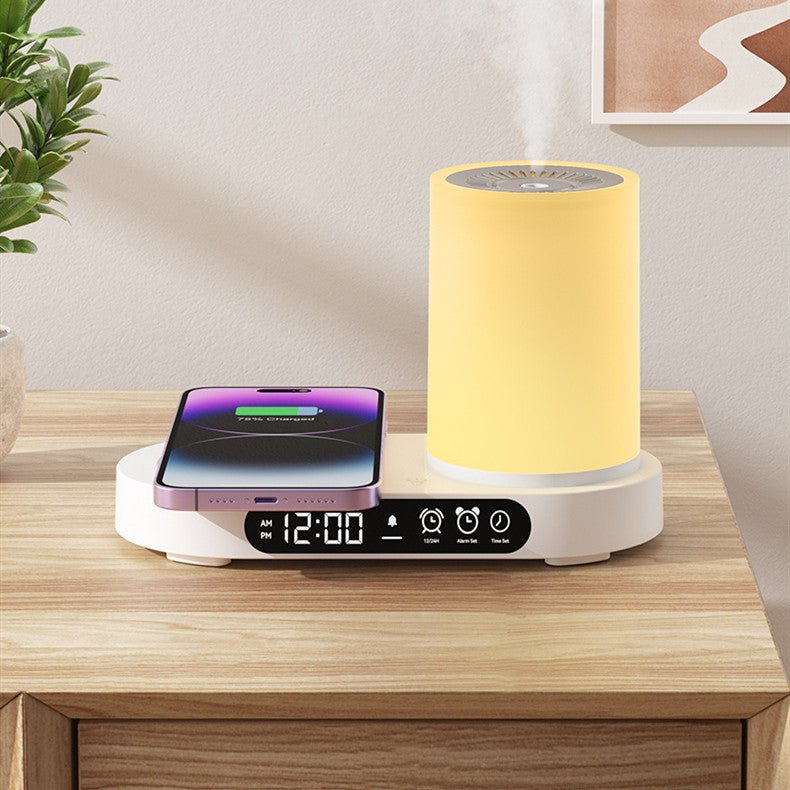 AromaGlow Luxe Desktop Diffuser in white finish on a bedside table charging a smartphone
