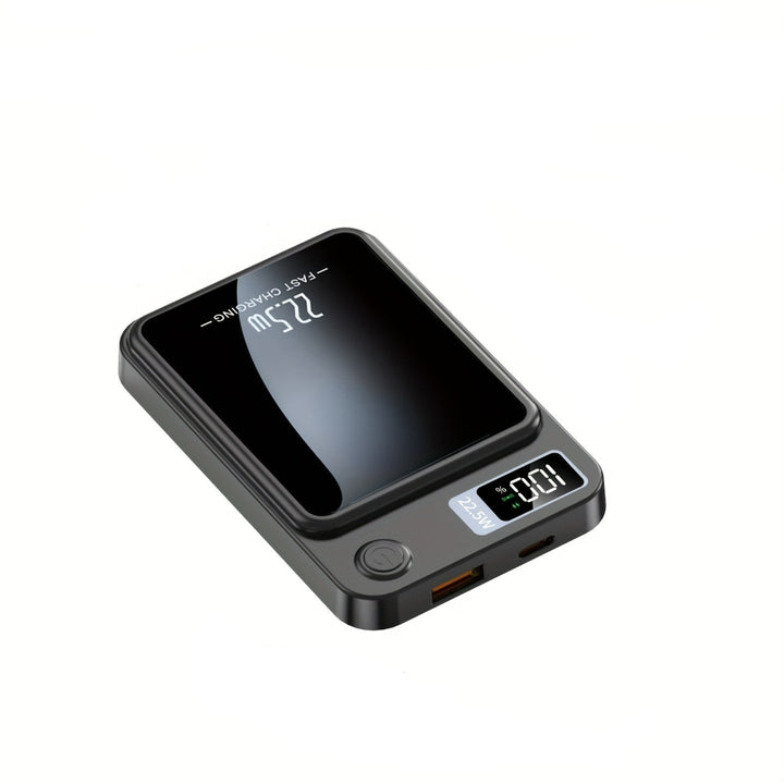 Black compact portable power bank close-up perspective