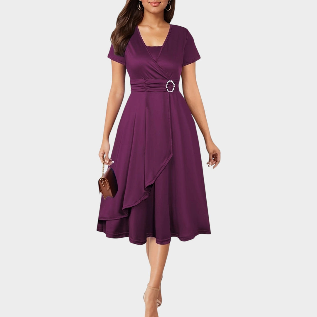 Elegant evening party dress featuring a flattering wrap design and midi length