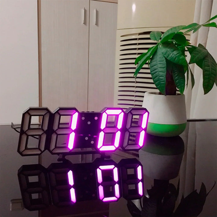 Sleek white LED digital clock with 3D design mounted on a living room wall