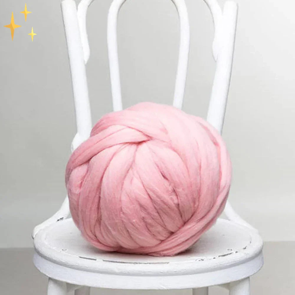 Close up of soft yarn loops during arm knitting process