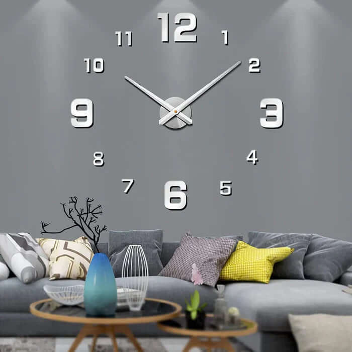 Silver DIY large wall clock mounted above grey living room sofa