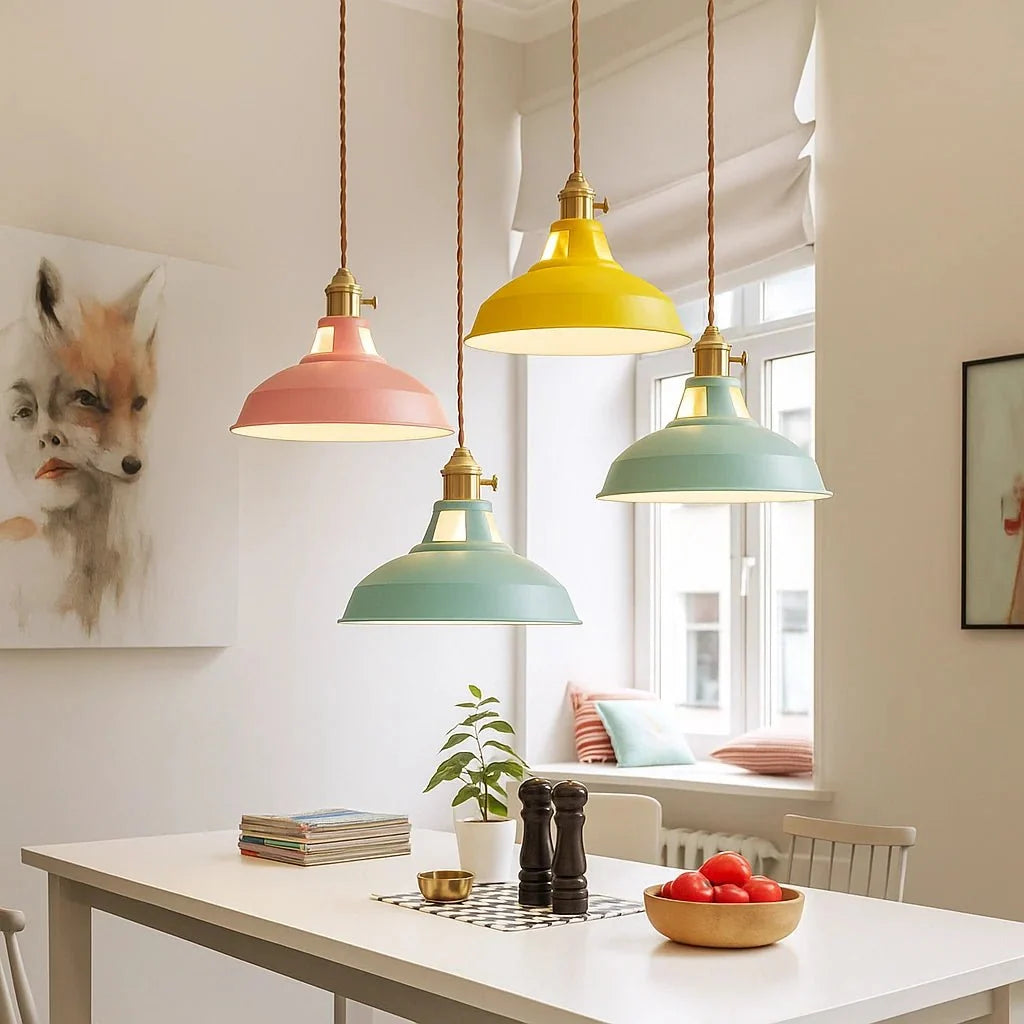 Modern dome pendant light glowing over a kitchen island