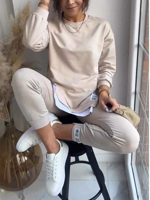 Stylish womens loungewear set showing neckline and relaxed long sleeves