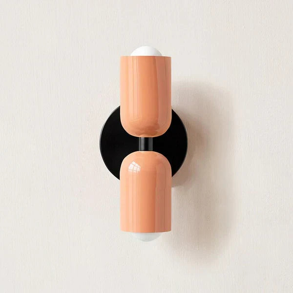 Modern DualGlow double LED wall lamp illuminating a living room wall