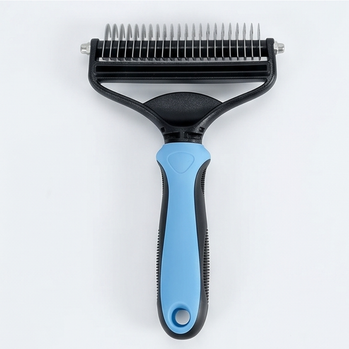 Double-sided dematting brush for dogs showing close-up of rounded teeth for safe pet grooming.