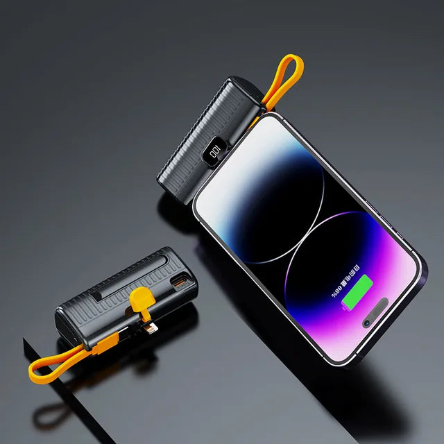Mini power bank plugged directly into a smartphone as a travel gadget
