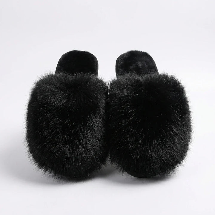 Fluffy slip-on slides offering cozy warmth and comfort for women