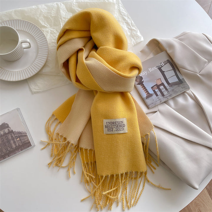 Rolled up reversible scarf ready for gifting or travel packing