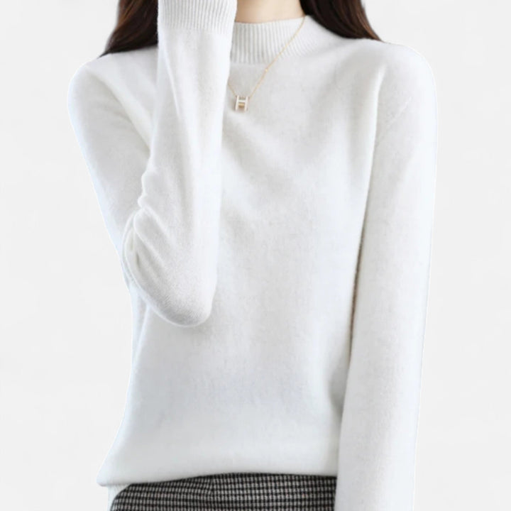 Women's soft knit mock neck sweater with long sleeves in casual style