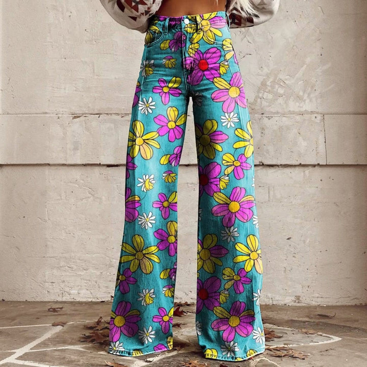 Model wearing retro fashion high waisted wide leg floral pants outdoors