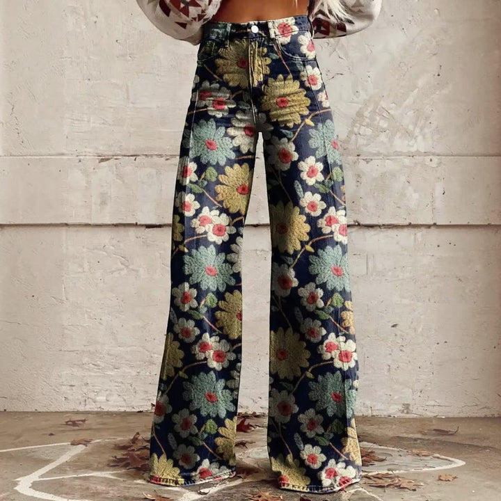 Back view of high waisted bell bottom pants featuring retro floral print