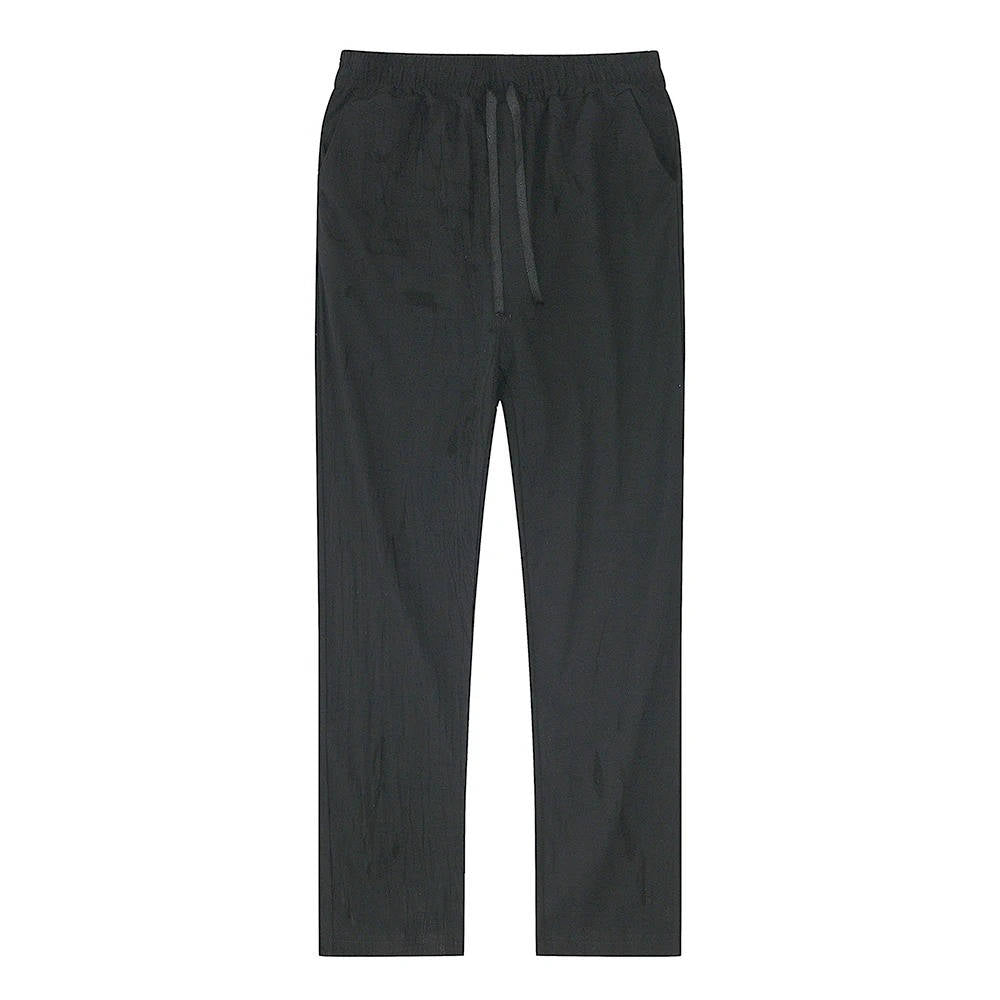 Close-up view of the drawstring waist on mens trousers