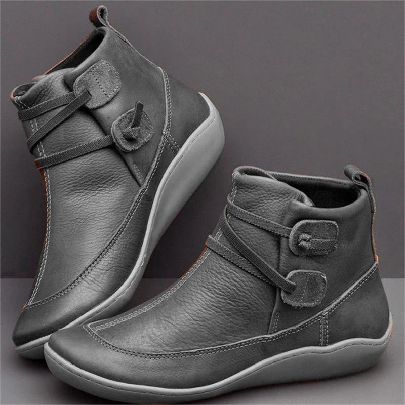 Gray women's orthopedic waterproof boots showcased from side angle