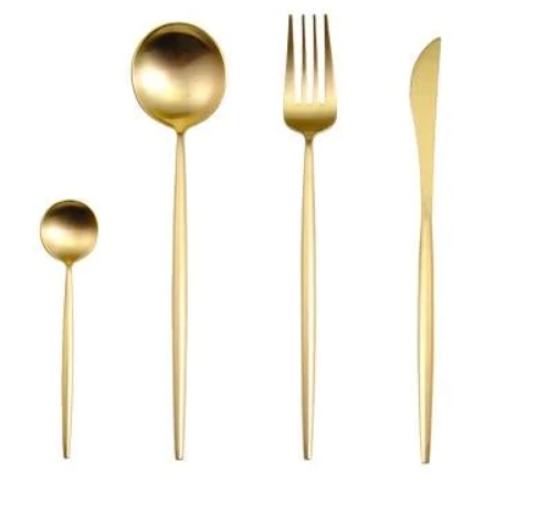 Multi-piece silver and gold silverware set for festive occasions