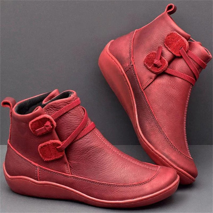 Side angle of women orthopedic waterproof boots with comfortable arch support and winter tread