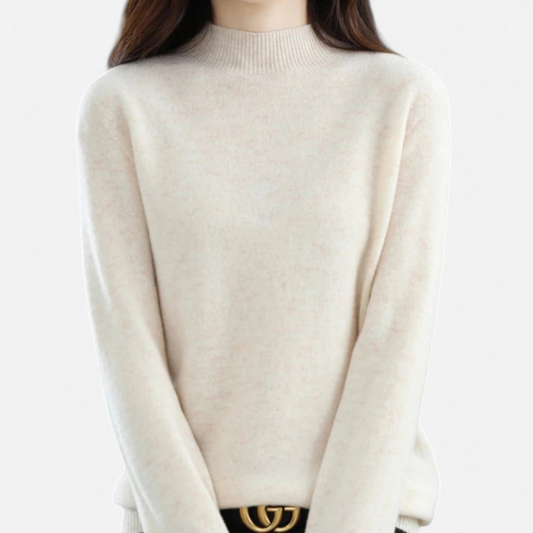 Full length view of stylish women's mock neck sweater outfit
