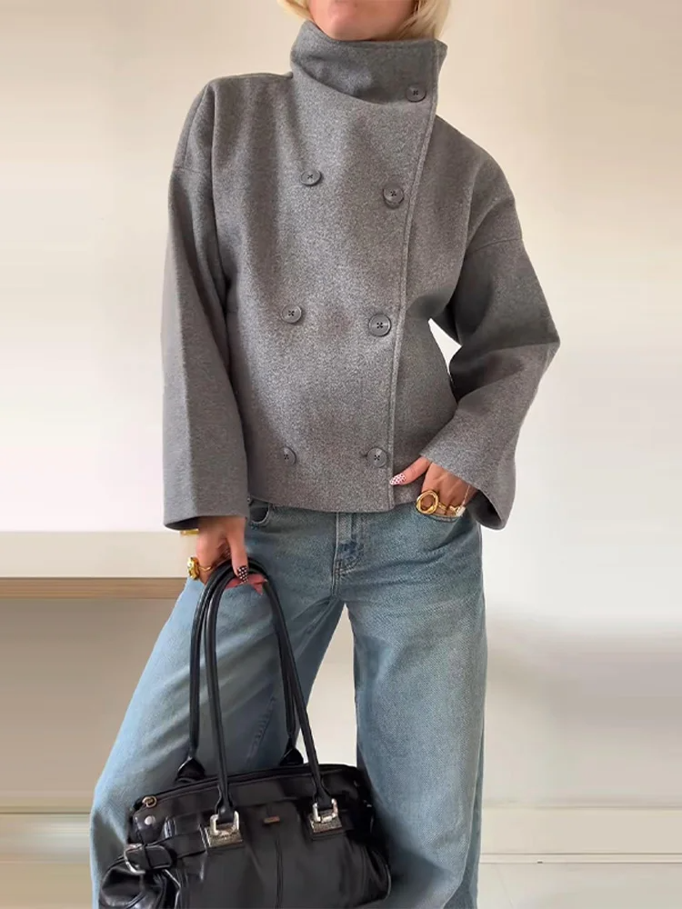 Full outfit view of womens winter jacket in classic style