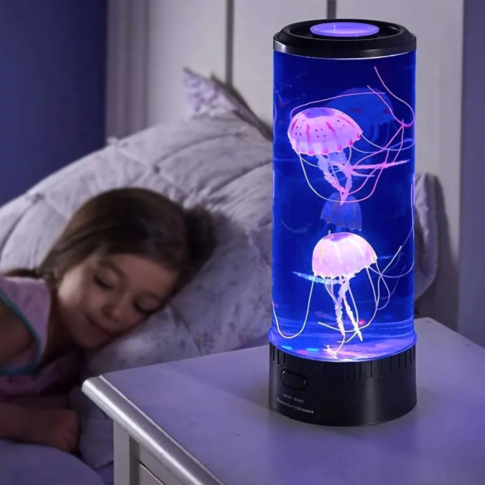 Child sleeping peacefully next to a glowing jellyfish lamp on a nightstand