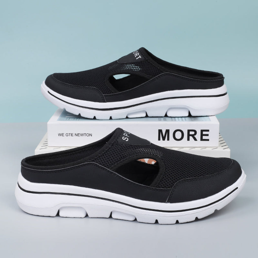 Pair of women's orthopedic sneakers displayed on a clean surface highlighting easy slip-on style