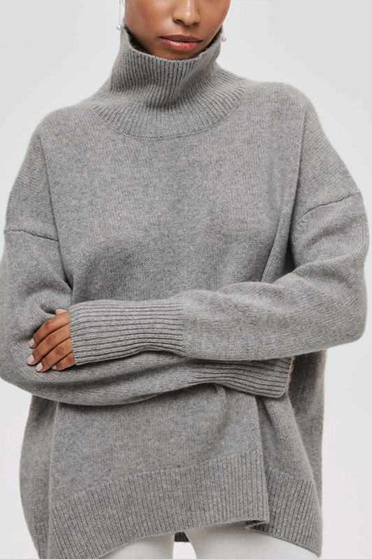 Close-up of womens winter knitwear featuring a warm turtleneck collar