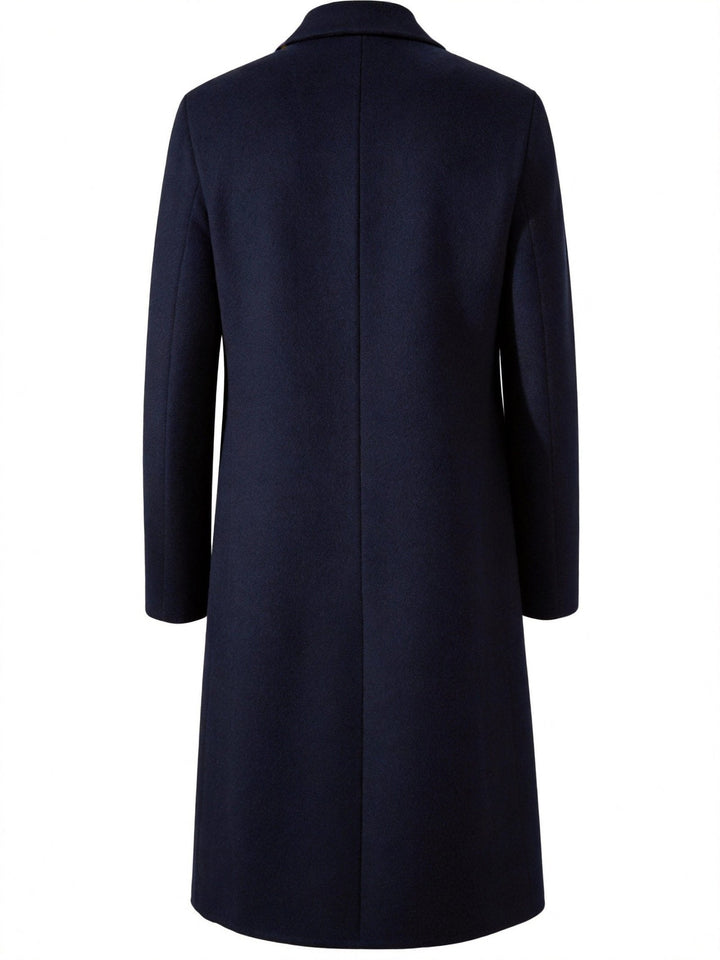 Back view of navy long trench coat showing extended cut