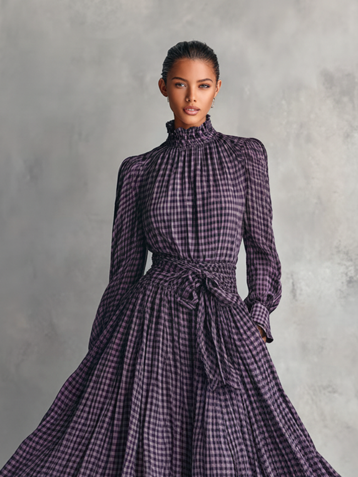 Close-up of the ruffled collar and plaid pattern on the blouse