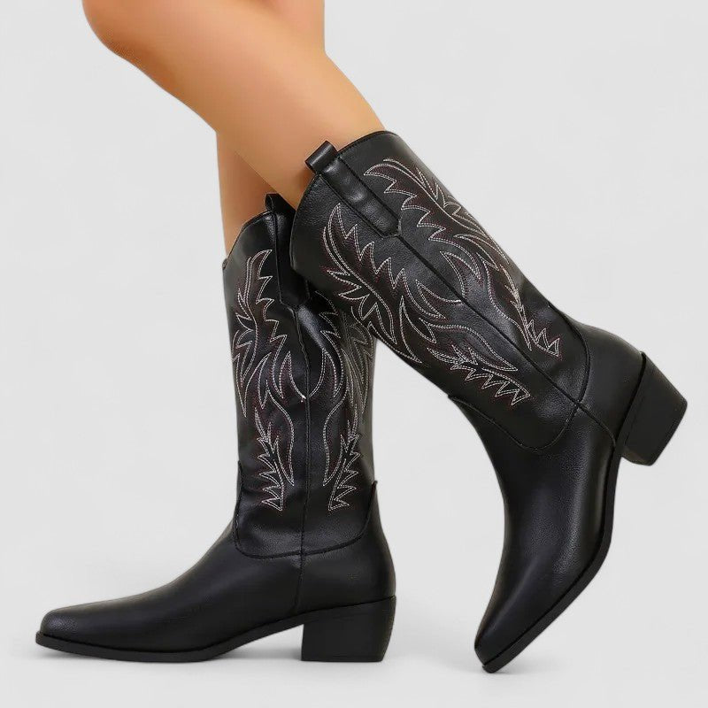 Black classic style western cowboy boots worn on model