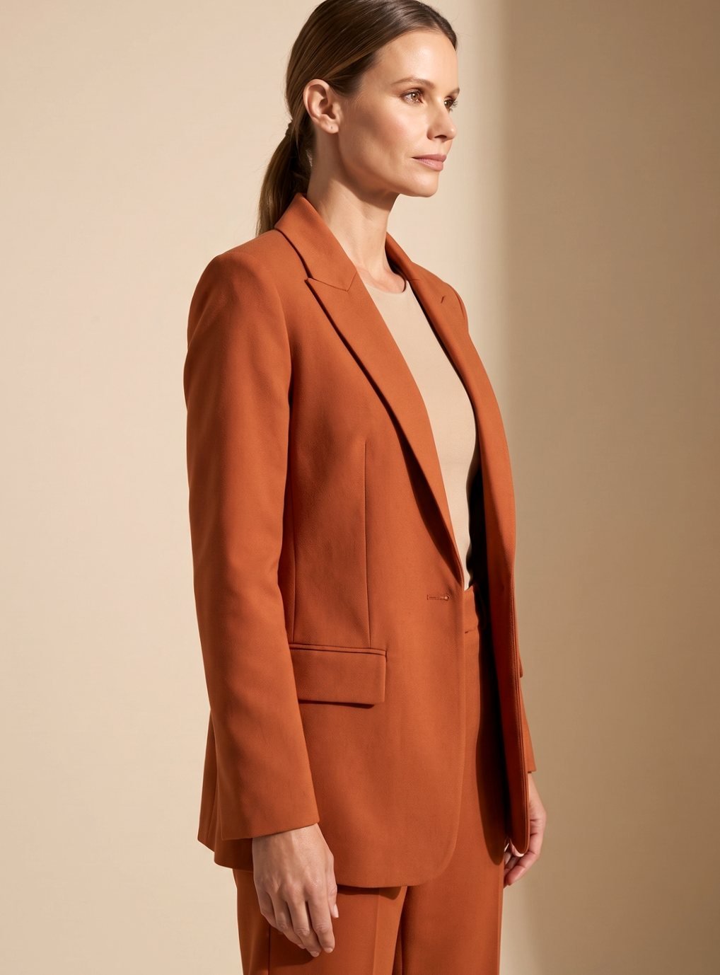 Complete stylish outfit layout of the blazer and flared trousers