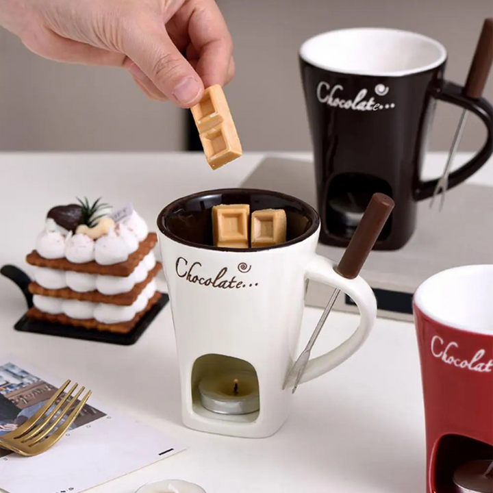 White and black ceramic chocolate melting bowls displayed with dessert