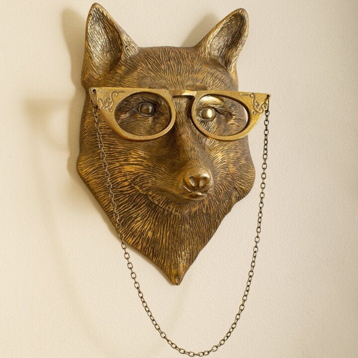 Stylized animal sculpture wall hanging perfect for creative home accents and decor