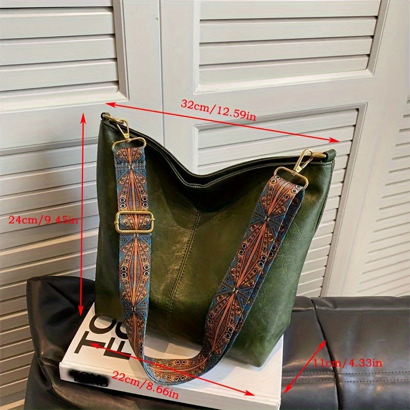 Descriptive infographic showing dimensions of the oversized handbag