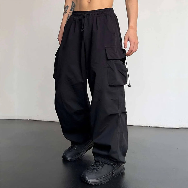 Streetwear pants style utility trousers featuring elasticated ankle cuffs