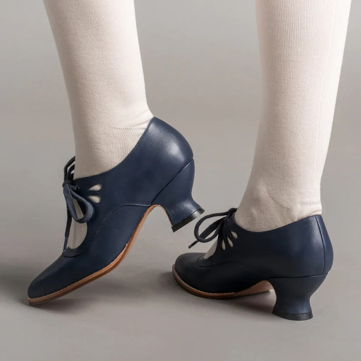 Close-up view of the textured outsole and durable heel on women's orthopedic dress shoes.